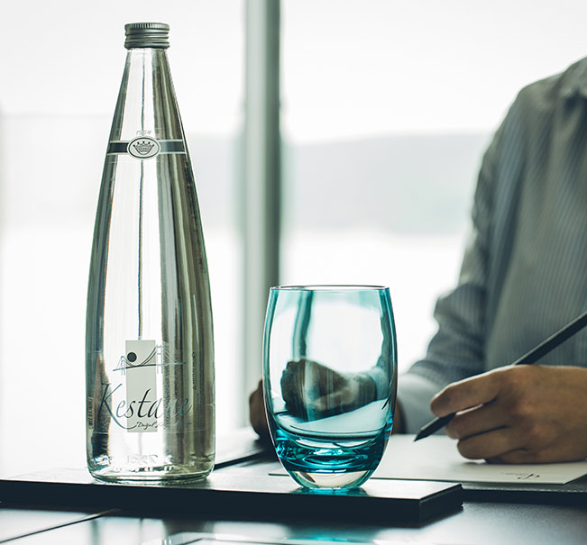 Kestane glass bottle water at meetings and events